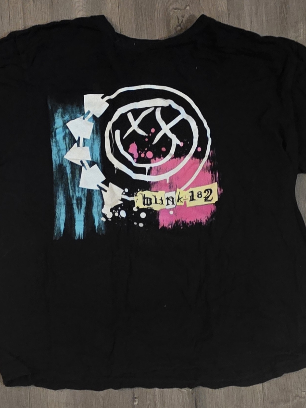 blink-182 Black Graphic Tee with Pink & Teal Logo